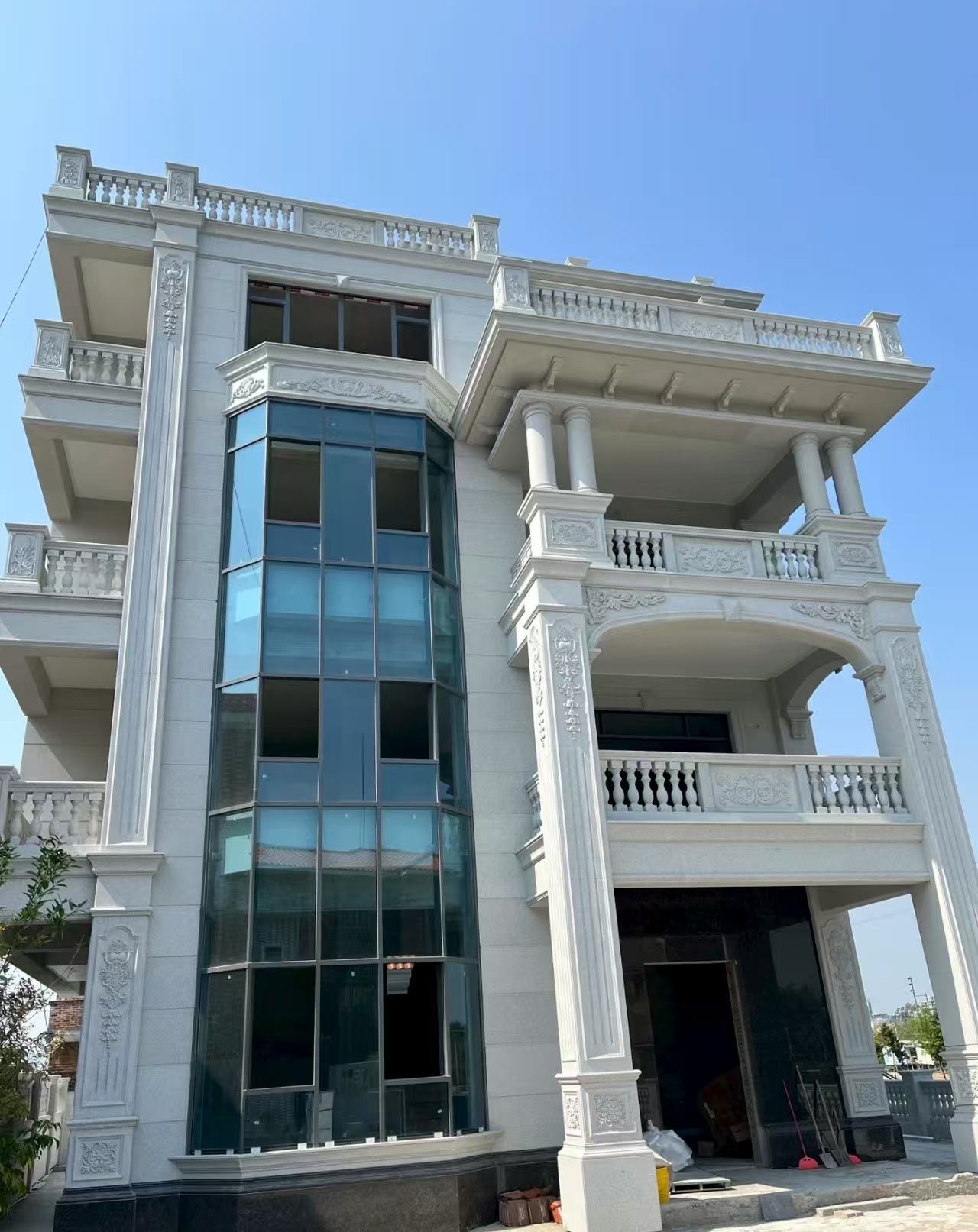 山东 白麻花岗岩别墅外墙干挂效果展示