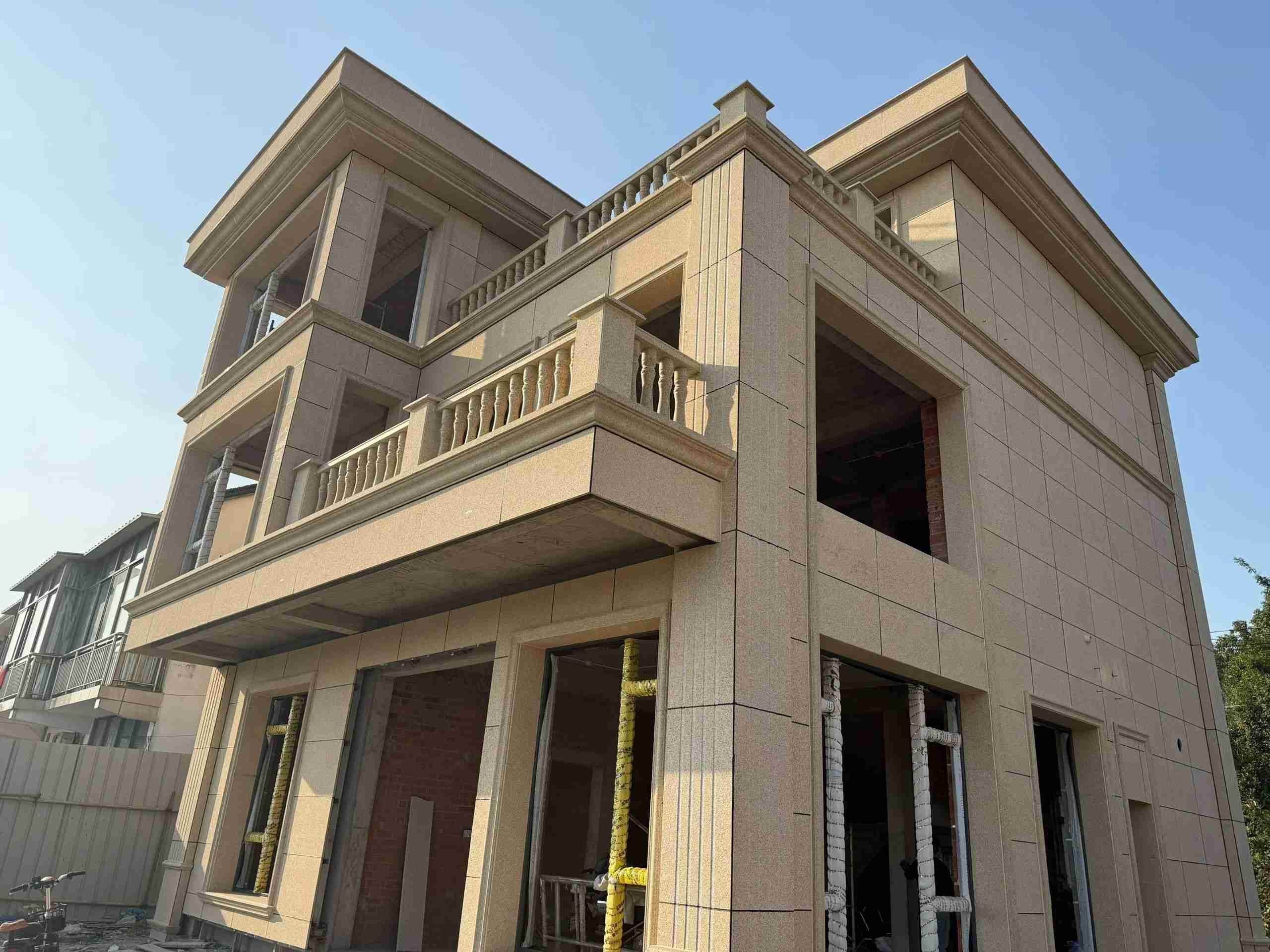 山东 黄金麻花岗岩石材荔枝面外墙干挂效果展示