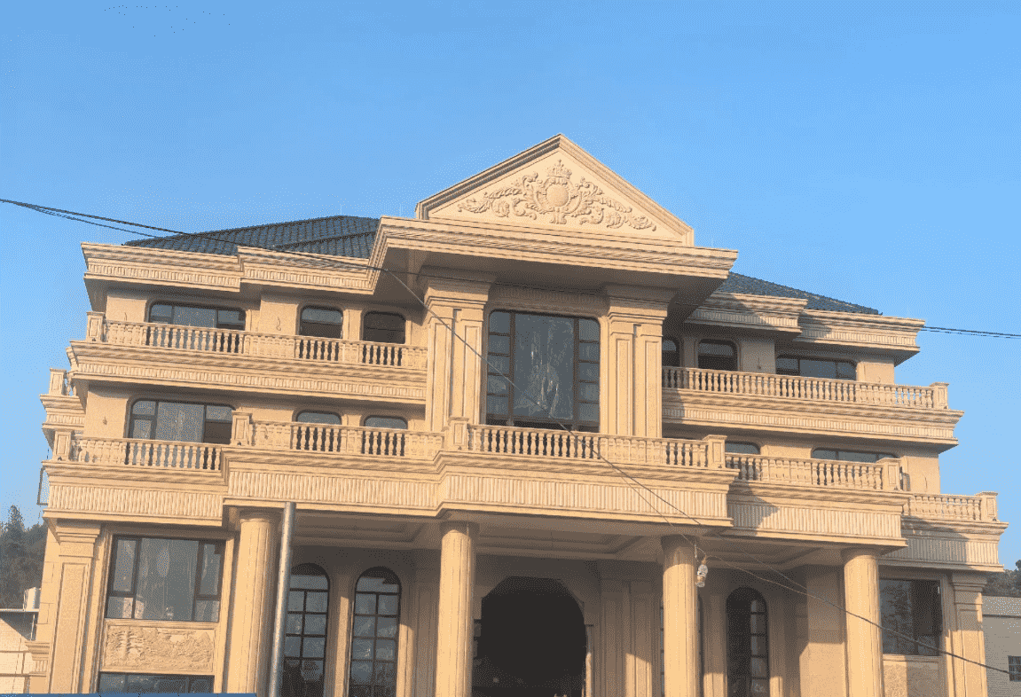 山东黄金麻别墅外墙干挂石材效果示例